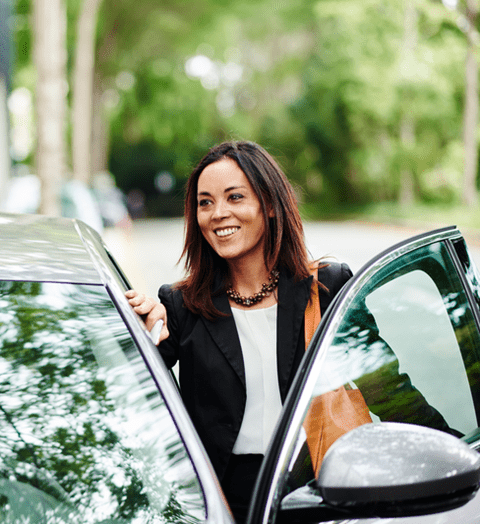 Woman getting into the car