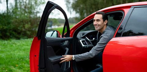 man_getting_out_of_his_car