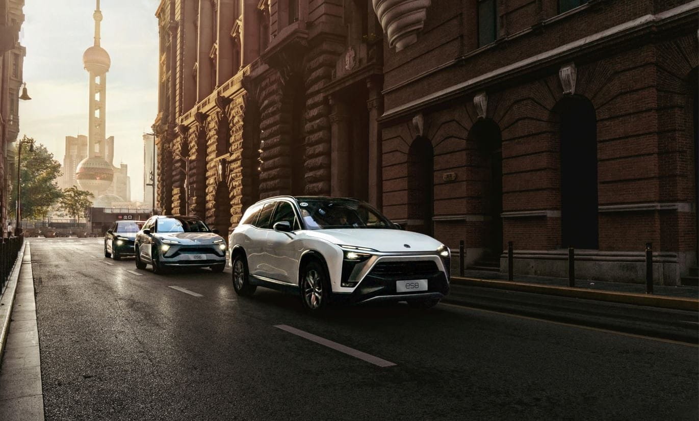 three Nio cars on the street-header