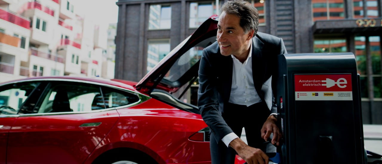 Amsterdam street charger and red Tesla
