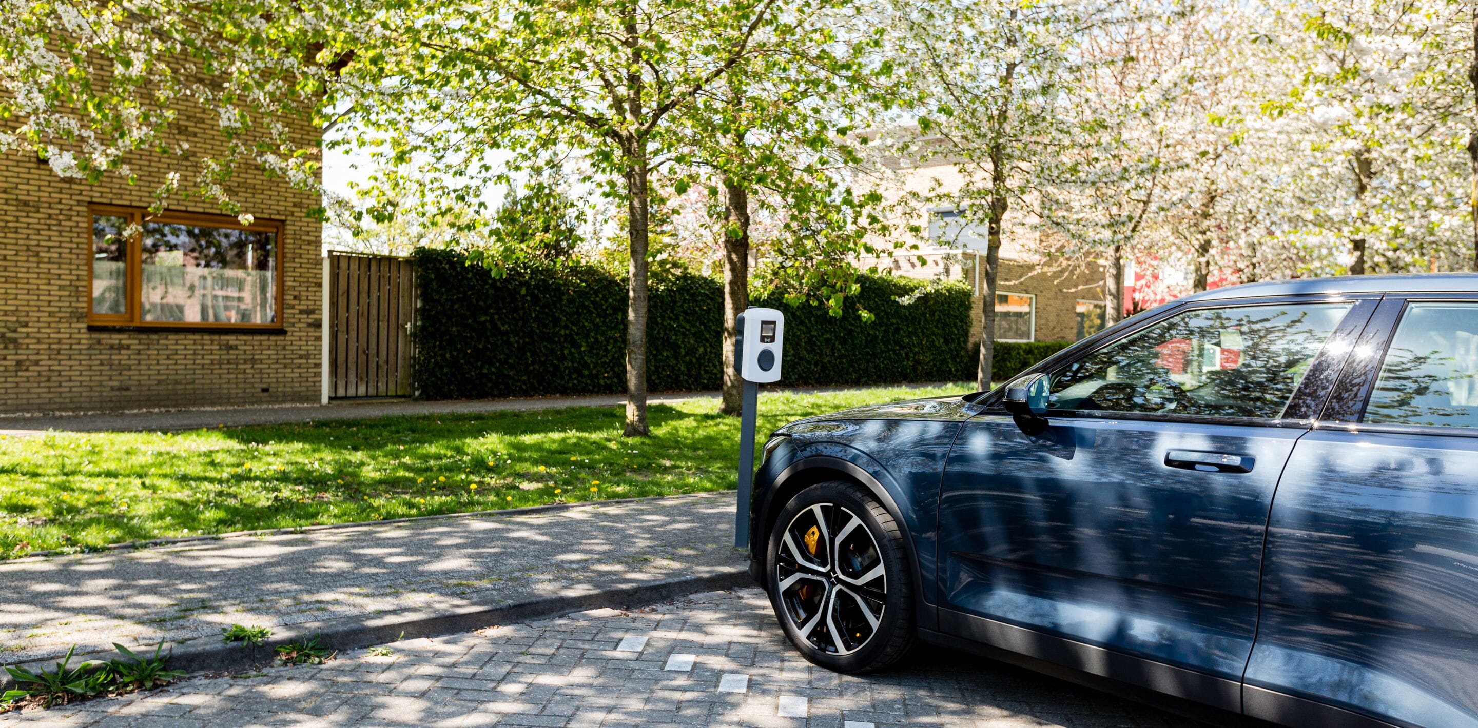 Blue Polestar 2 long range parked and charging