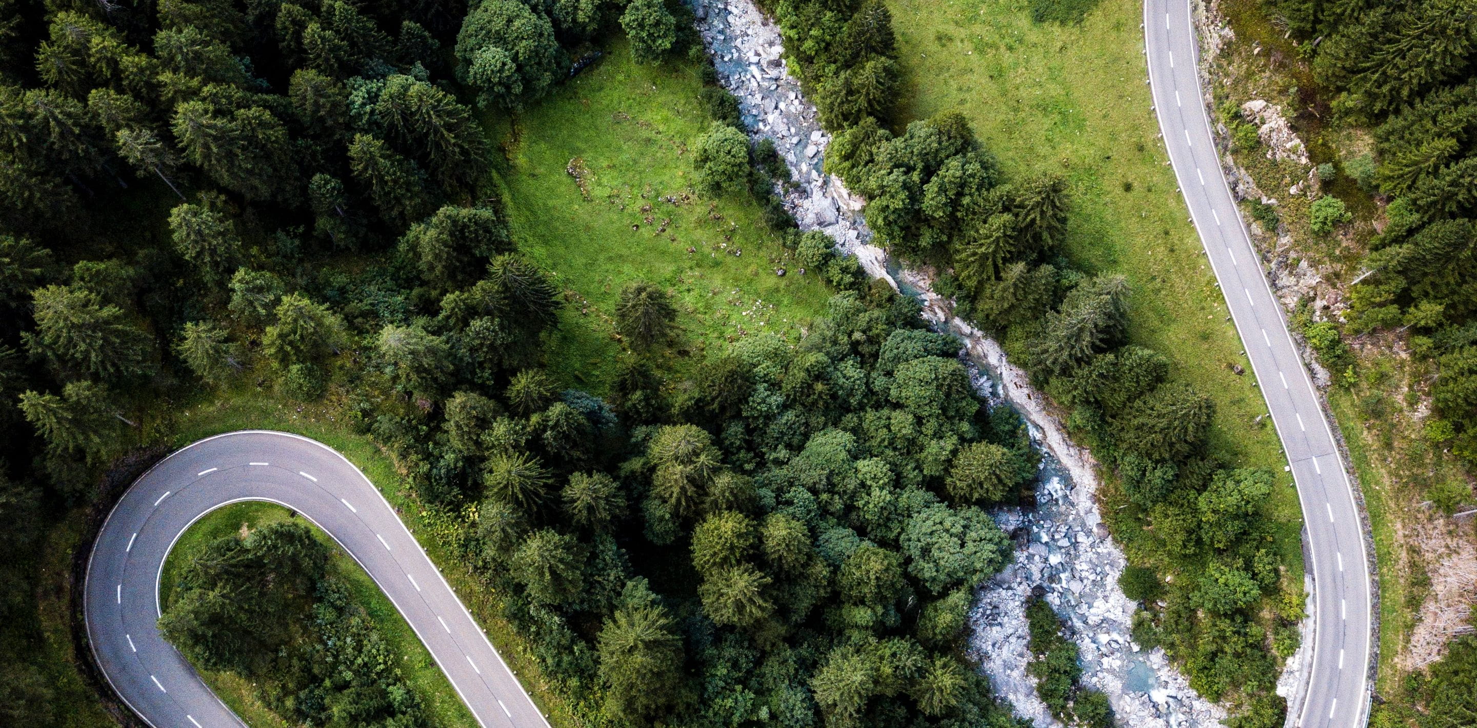 Aerial shot- zigzag road in the countryside