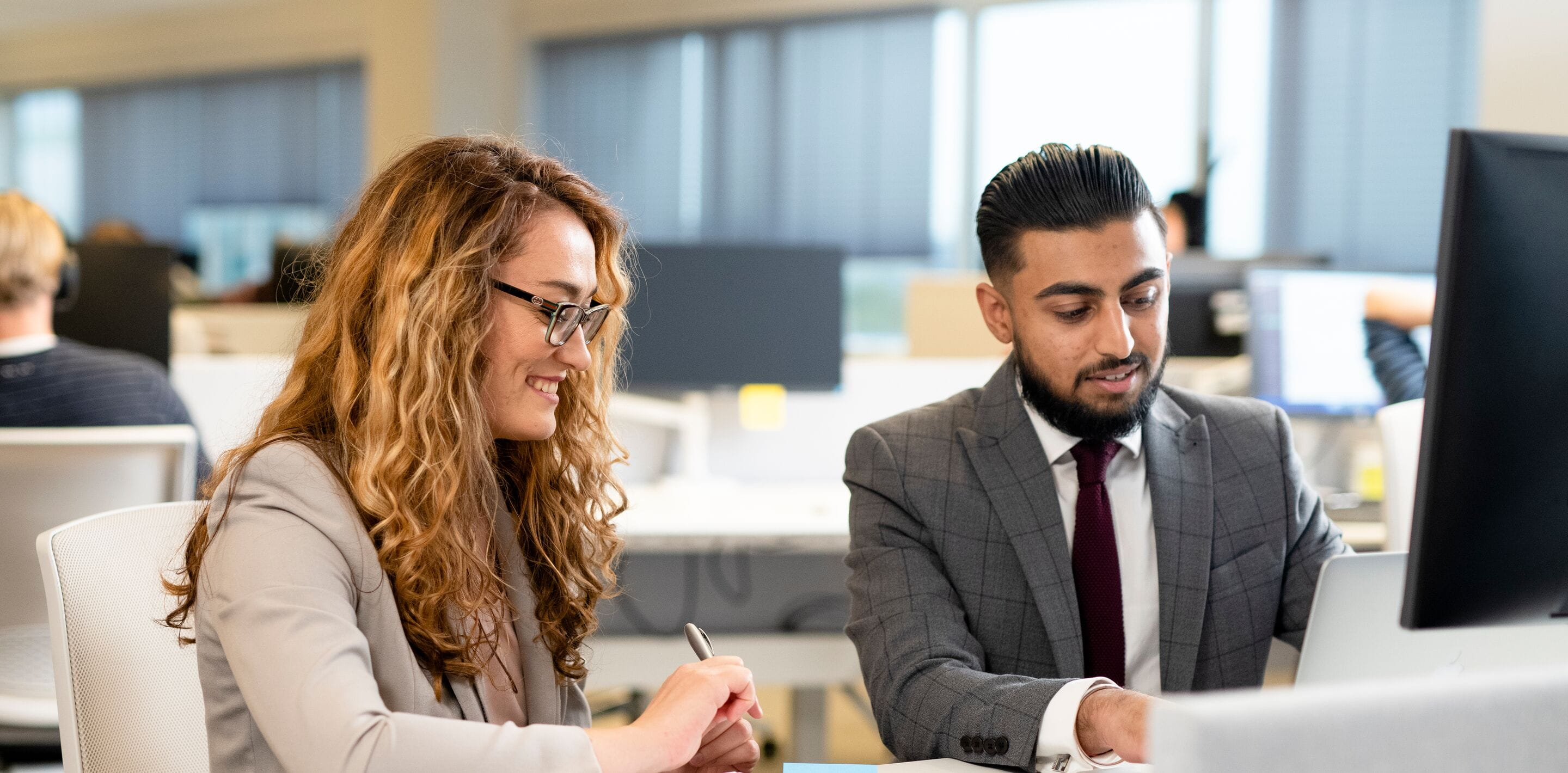 Close up - man and woman working in office