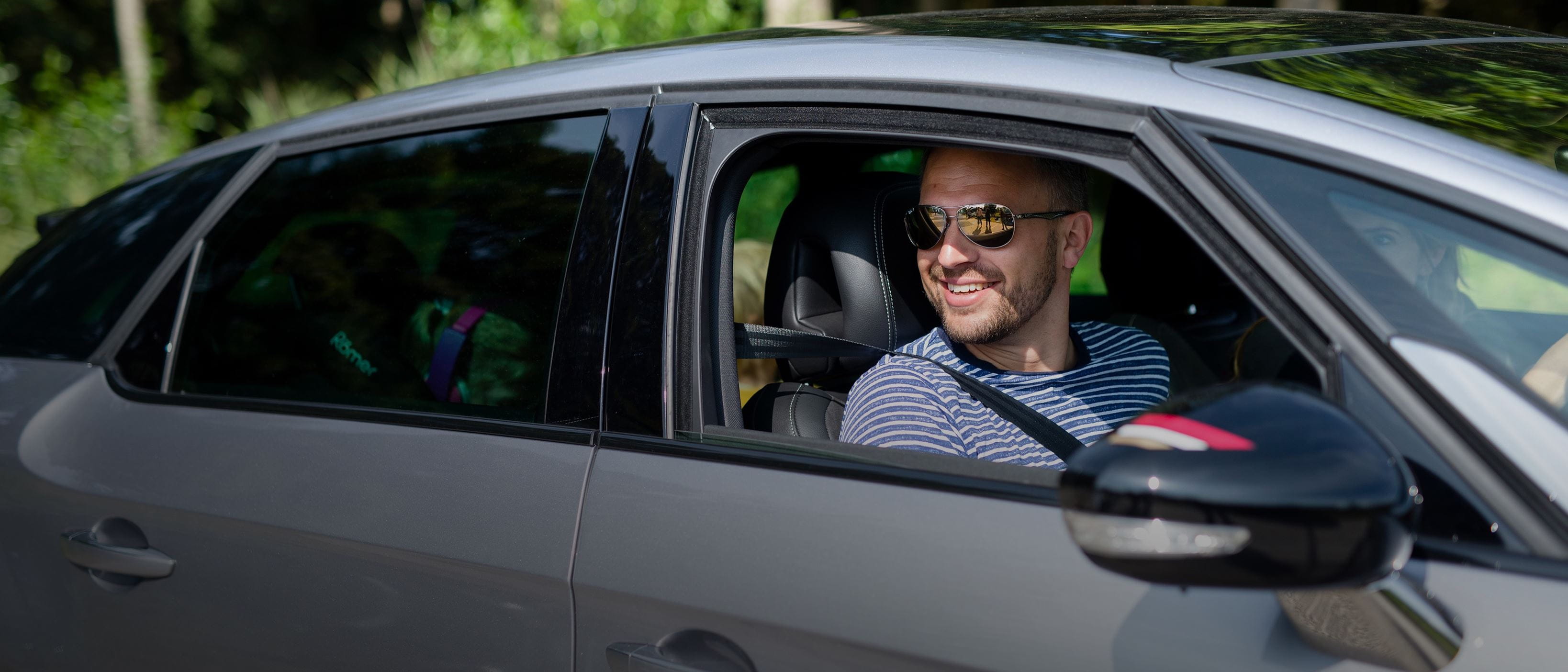 Man driving car