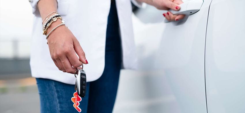 woman with key in hand 1
