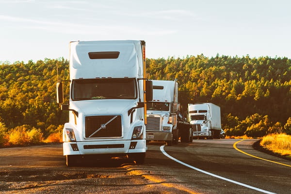 white-volvo-semi-truck-on-side-of-road-2199293 - resized